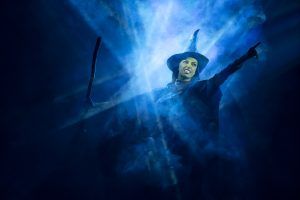 An actress performing on stage during WICKED.