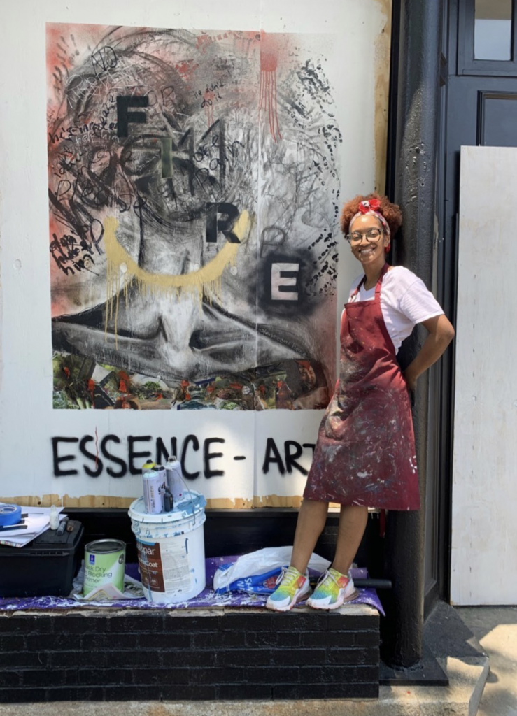 artists painting murals in downtown greensboro